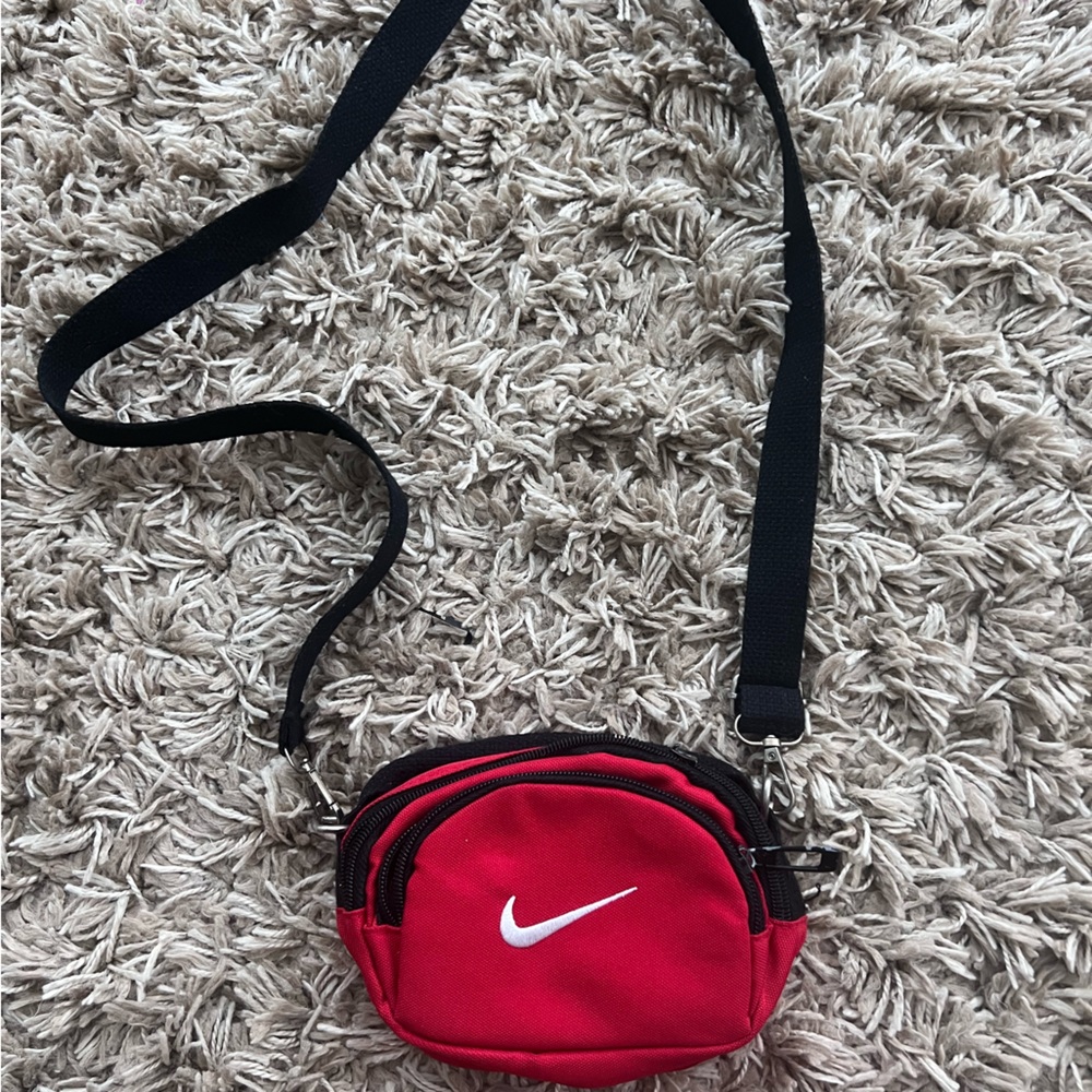 Green & red Nike crossbody/ shoulder bags